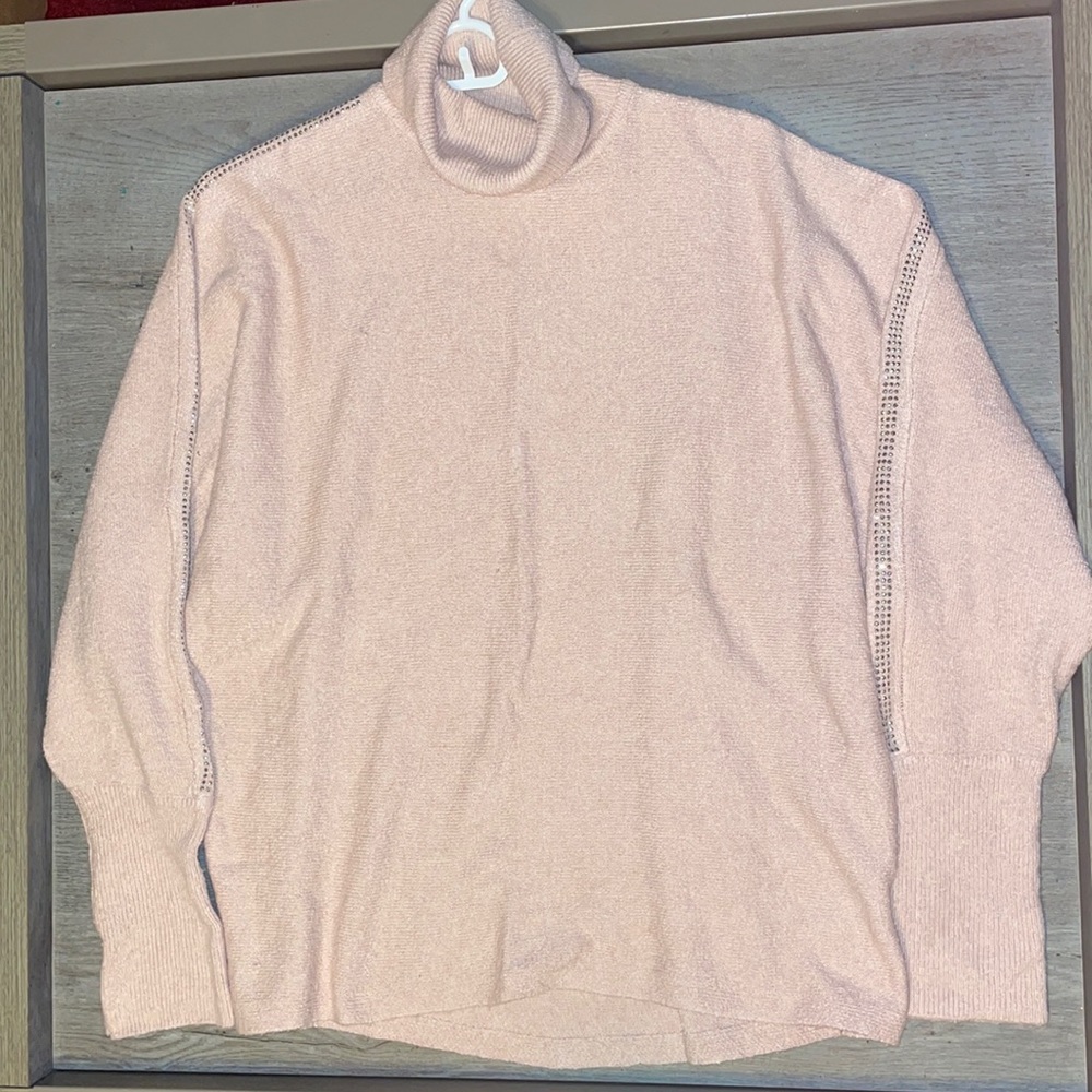 Jennifer Lopez light pink cowl neck sweater